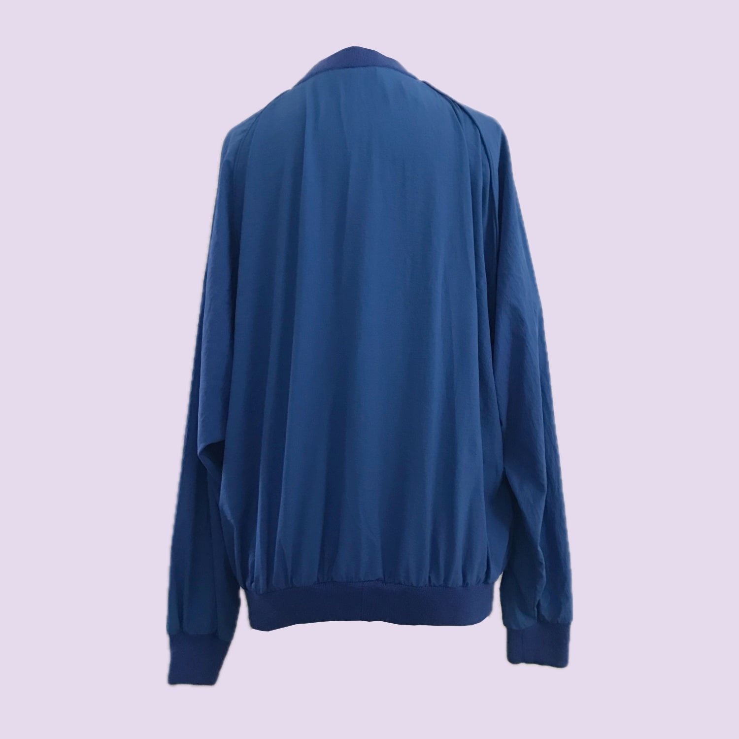 vintage-1980s-blue-embroidered-v-neck-golf-pullover